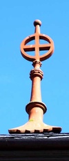 terracotta finial above bell housing