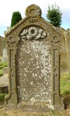 headstone with wreath motif