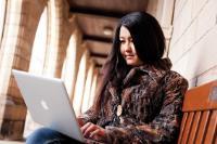 Student searching for jobs on a laptop