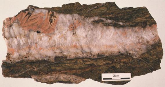 Quartz and K-feldspar vein. The K-feldspar is flesh pink in colour