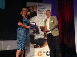 Amanda Lee and Peter Murchie receiving the Athena SWAN Bronze award