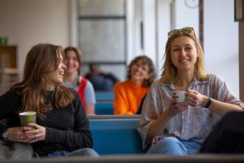 Image of two girls laughing in Union Brew cafe