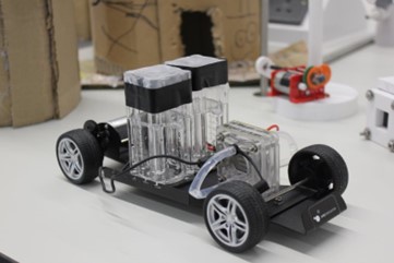 A close up of a model toy hydrogen fuel cell used for the experiments and demonstrations with school pupils