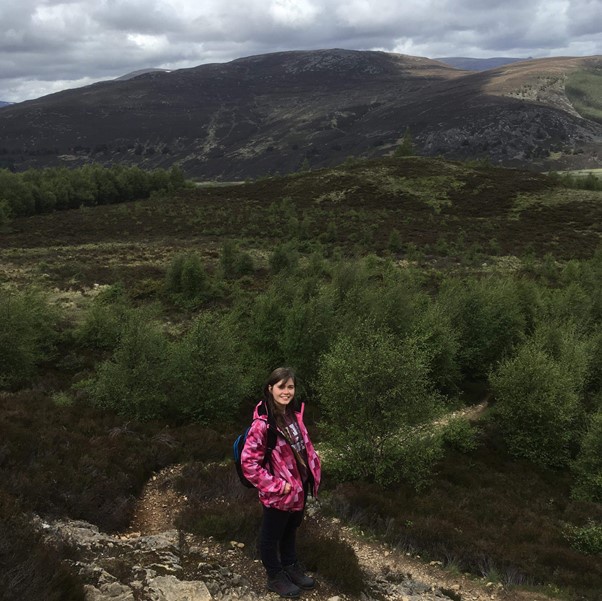 Girl climbing In Braemar