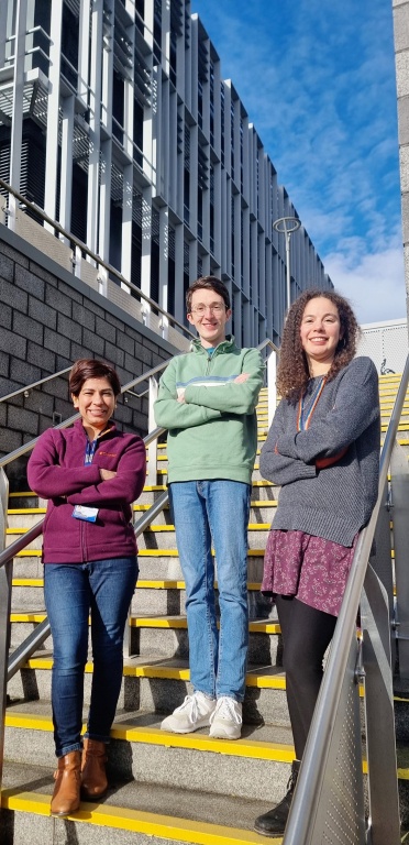 Kusum Singal, Bradley Scott and Clarisse de Vries on the steps to the Institute of Medical Sciences