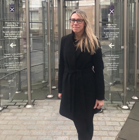 Kate O'Sullivan outside the Scottish Parliament