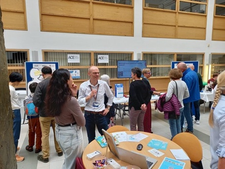 Photo of ACE team members chatting to the public on Doors Open Day