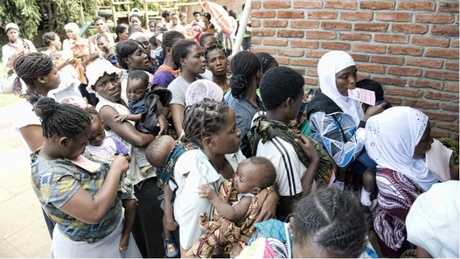 Mothers queuing outside Bwaili Clinic in Lilongwe, Malawi to get their babies weighed