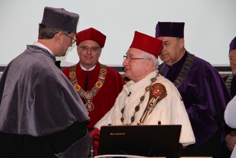 Prof Wiercigroch receiving degree from Prof Stanislaw Bielecki