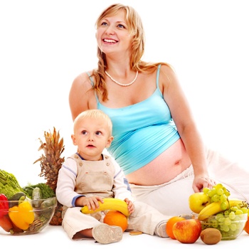 Pregnant lady with child and foods