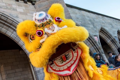 A close up photograph of a chinese dragon face outside Elphinstone Hall