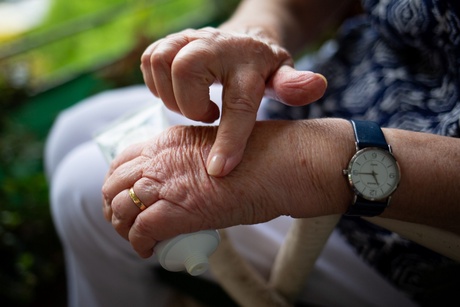 Woman's hand massaging painful joints