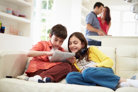 Children playing on a tablet