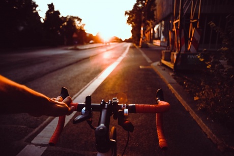 Person on a bike riding in bike lane