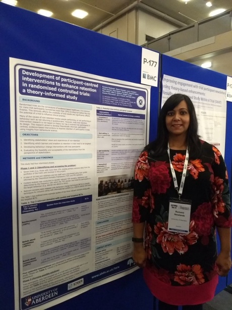 Rumana Newlands with her poster which shares the exciting findings from the STEER project about trial retention