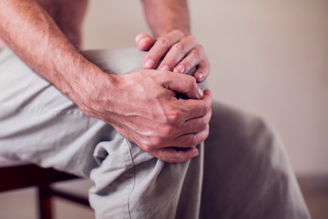 Picture of a patient holding their knee