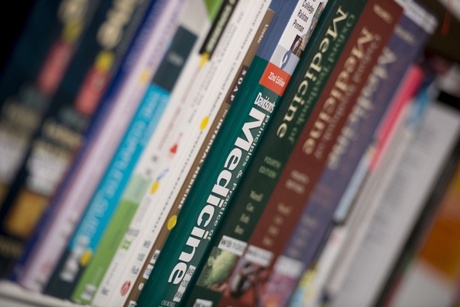 Medical textbooks on shelf