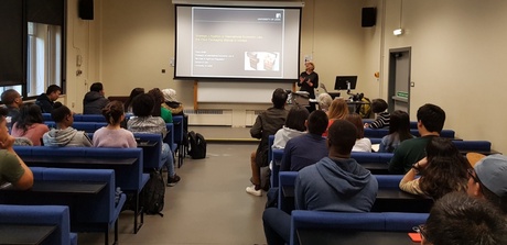 Prof Fiona Smith Presenting her Seminar to a group of attendees