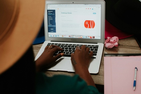 Person using laptop. Image by Brandy Kennedy on Unsplash