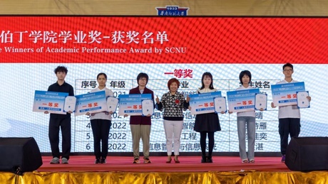 Students from South China Normal University receiving thier awards from the Aberdeen Institute