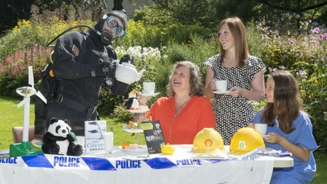 Diver, Rob Boyd, is joined by Lynne Staples-Scott (BP), Gillian Hay (Shell) and volunteer Amy Phillips, at the TechFeast tea party to launch this year’s annual festival of Science, Technology, Engineering and Maths.