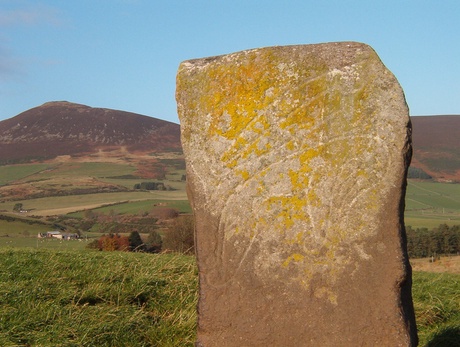 The Craw Stane, with Tap O’ Noth hillfort on the left horizon