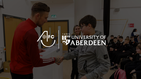 Aberdeen FC Community Trust logo and University of Aberdeen crest