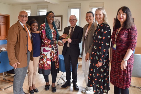 From left to right: Lee Jasper, Strategic Adviser to Black Impact, Lydia Amusan, Executive Assistant, Ceewhy Ochoga, Founder and CEO of Black Impact, George Boyne, Vanessa Mabonso Nzolo, AUSA Student President, Ruth Taylor, Vice-Principal Education and Race Equality Strategy Group co-convenor and Janine Chalmers, Head of Organisational Development.