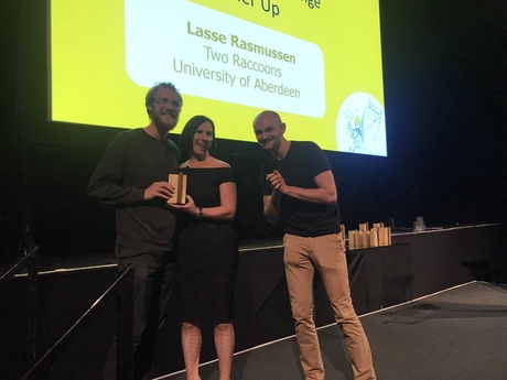 The University team receiving their awards on stage