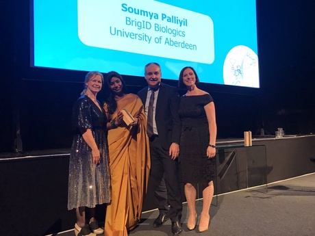 The Univeristy team receiving their awards on stage