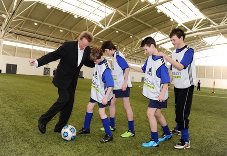 Denis Law with pupils from his former schools