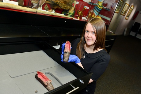 Louise Wilkie with the slippers belonging to Princess Pauline Borghese