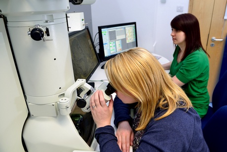 Dr Debbie Wilkinson and Gillian Milne pictured using the new Transmission Electron Microscope