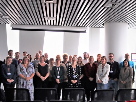 Large group shot of staff and DYW team members at the Sir Duncan Rice Library