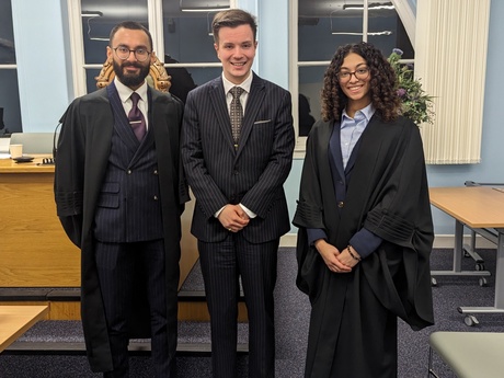 Smiling Syed and Dina with Master of Moots Dr Jonathan Ainslie