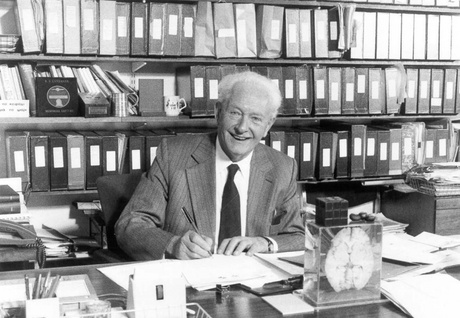 John Mallard at his office desk