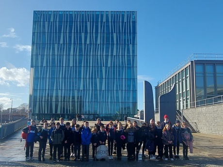 The group of pupils outside the Sir Duncan Rice Library