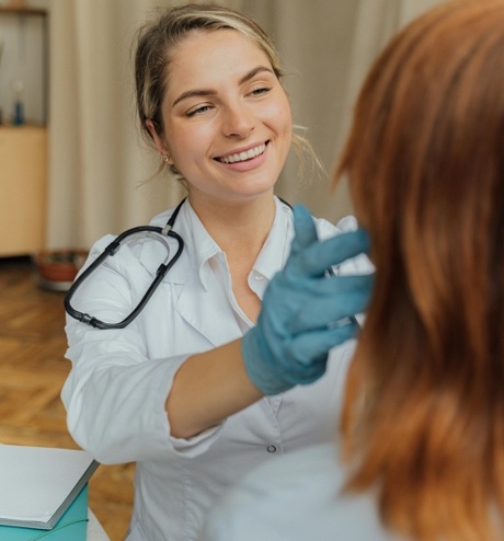 Doctor examining patient