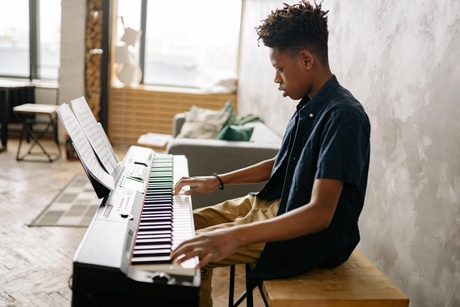 Child playing piano