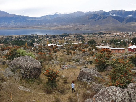 Valentina setting up a plot in a rocky boulder field