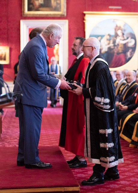 Professor George Boyne and Professor Graeme Paton receive the award from HRH Prince Charles, The Duke of Rothesay and HRH The Princess Royal, Princess Anne