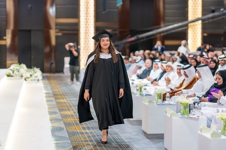 Graduate walking to the stage