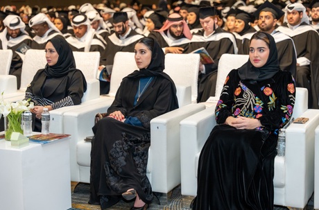 Audience members watching the ceremony