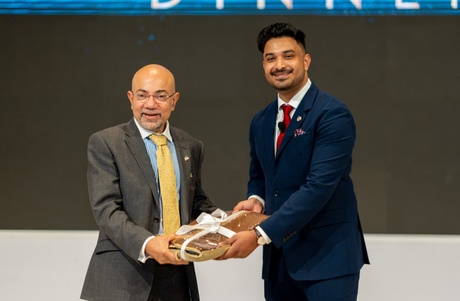 graduate shaking hands with Professor Siladitya Bhattacharya