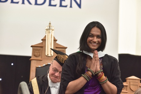 Woman smiling onstage