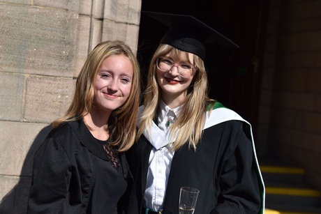 Two girls smiling at the camera