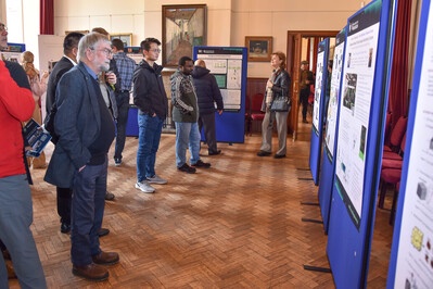 People looking at research posters