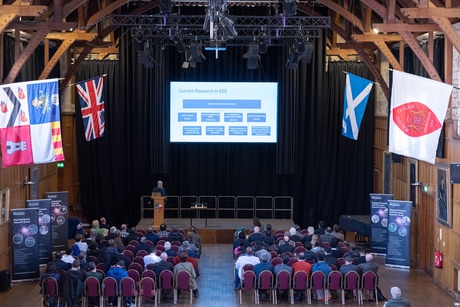 An audience in Elphinstone Hall listening to a presentation