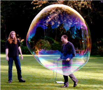 Outdoor demonstration of an enormous soap bubble