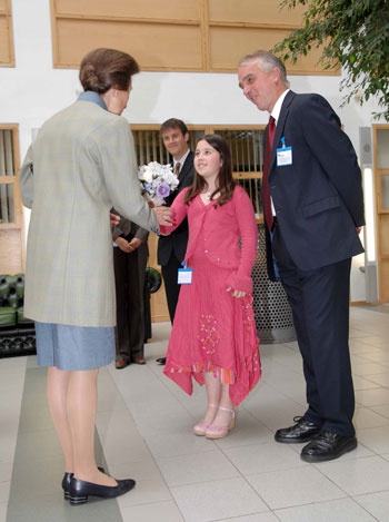 11-year-old Hannah Ross from Fraserburgh presents a posy to the Princess Royal